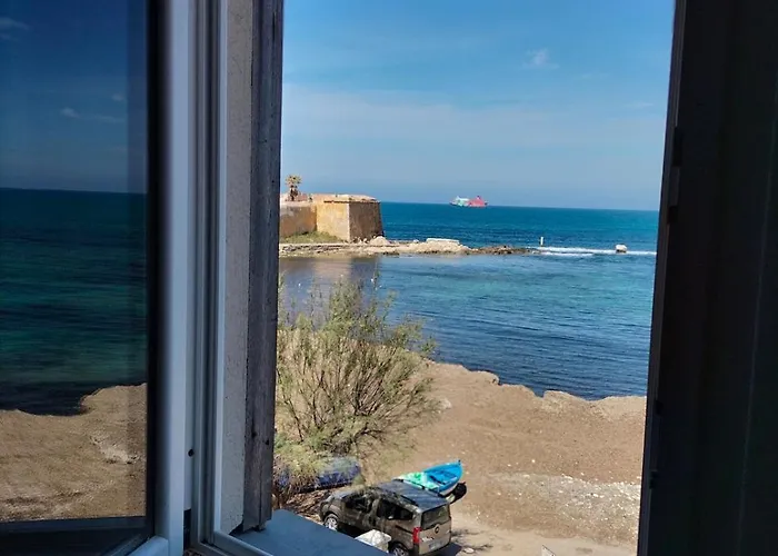 Ossuna Seaview Door * Τραπάνι